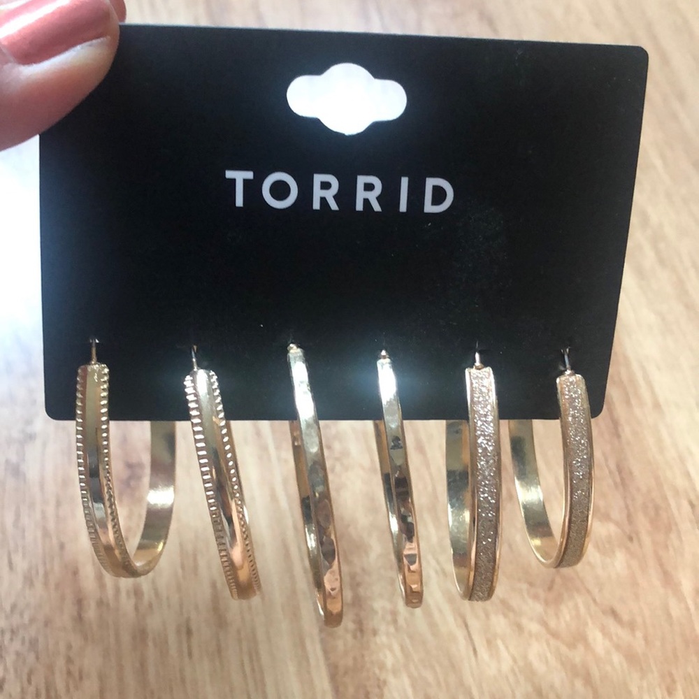 Torrid 3 pack gold hoop earrings.